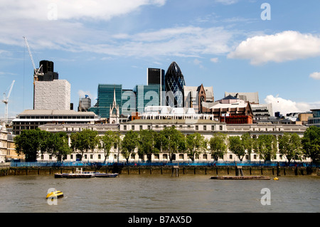 Skyline Gherkin financial bank commercial centre district riverfront river Thames Mary Axe Swiss Re tower of London skyline Stock Photo