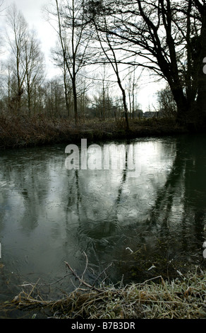 frozen river or stream in rural essex Stock Photo