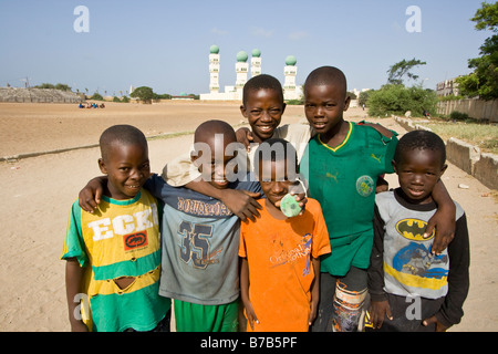 Senegalese Boys in Front of a Mosque in Dakar Senegal Stock Photo