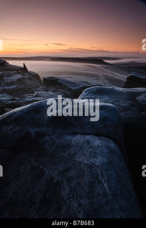 Dawn view towards Higger Tor from Stanage Edge, Peak District National Park, Derbyshire, England, UK Stock Photo
