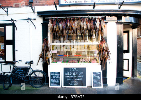 Game butchers in Ludlow England Stock Photo