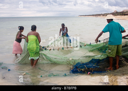 Villagers fishing with a seine net Ifaty Madagascar Stock Photo