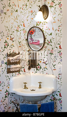 An old style SINK and MIRROR in a VICTORIAN BED AND BREAKFAST PACIFIC GROVE CALIFONRNIA Stock Photo