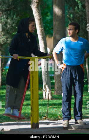Man and Woman Exercising in a Public Park in Esfahan Iran Stock Photo