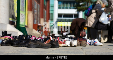 Shoes outside Hall of the Great Hero, Jogyesa Temple, Seoul, South Korea Stock Photo