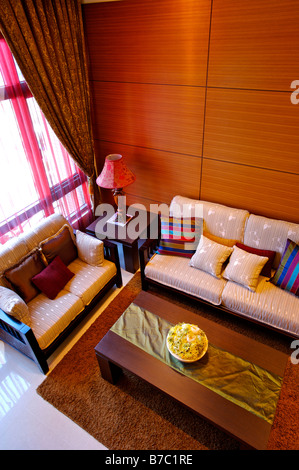 Overhead view of a modern living room with sofas and a table in the middle Stock Photo