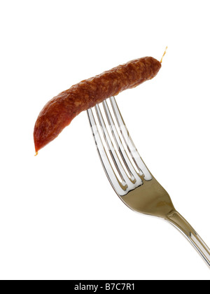 Fresh Tasty Spiced Pfiffikus Austrian Sausages On A Fork Isolated Against A White Background With No People and A Clipping Path Stock Photo