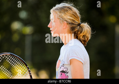 girl playing tennis Stock Photo