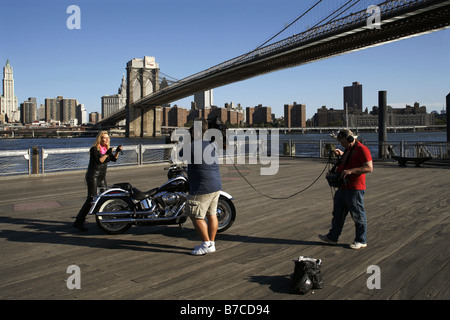 Film Crew & Brooklyn Bridge, Fulton Ferry Landing, New York City, USA Stock Photo