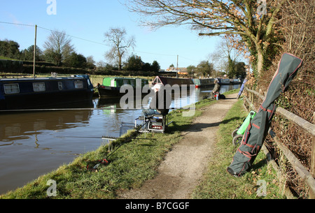 Fishermen fishing in the Coventry canal, Nuneaton, Warwickshire, after ...