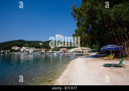 The beach and little harbour at Agios Stefanos in Corfu Stock Photo