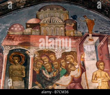 Fresco depicting People Taking Refuge in the St Johns Monastery Chora Patmos GreeceCommemorates the site where Saint John of Patmos composed his Gospel and the Apocalypse Stock Photo