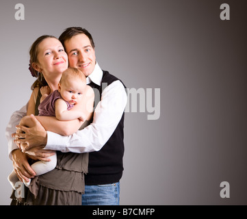 Picture Of Happy Mother With Baby Over White Stock Photo - Alamy