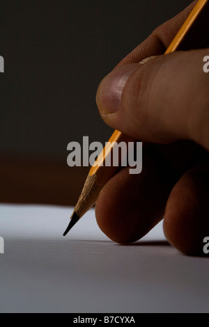 Extreme Close-up Of Hand Holding Pen Over Gantt Diagram Stock Photo - Alamy