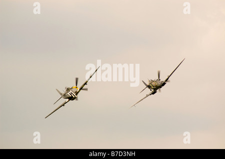 Spitfire and Mustang Flying in close Formation at Biggin Hill Airshow, England, UK 2008 Stock Photo