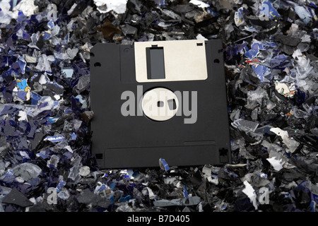 floppy disc on a bed of shredded magnetic media Stock Photo