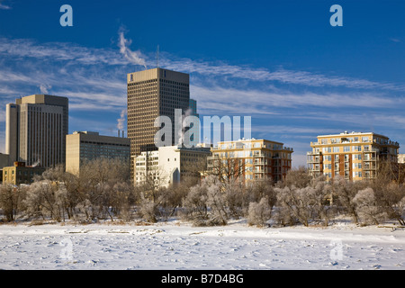 Frazzle ice on the frozen Red River, and Winnipeg skyline, Manitoba, Canada. Stock Photo