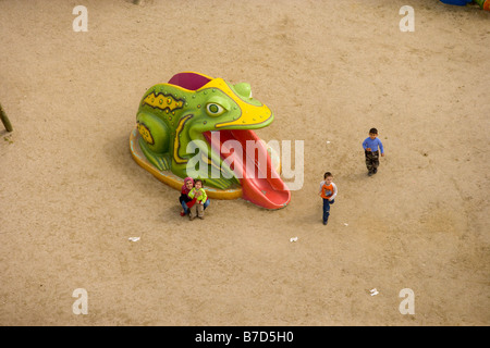 Aerial view of children next to a slide in shape of a giant frog Buyukcekmece Istanbul Turkey Stock Photo