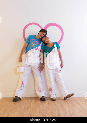Couple with heart painting. Stock Photo