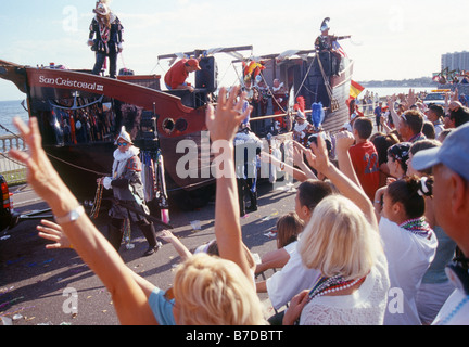 Crowds cheer a float during the annual Gasparilla pirate invasion festival in Tampa Florida Stock Photo