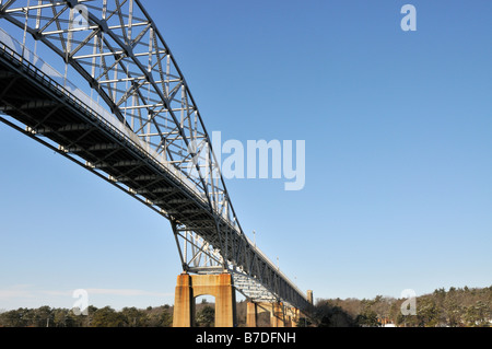 View of steel bridge from below showing beams angles concrete support trusses in a graphic abstract style Bourne Bridge Stock Photo