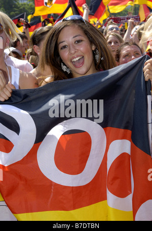 Woman in lingerie with large number of euro money laying on bed. Half