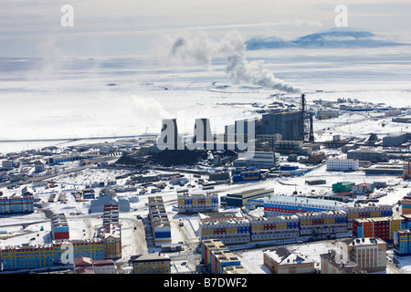 Colourful apartment buildings with Coal power plant,  Anadyr, Chukotka Siberia, Russia Stock Photo