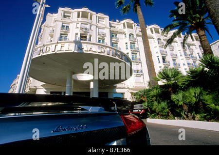Luxury car parked in front of the prestigious Martinez hotel in the Croisette of Cannes Stock Photo