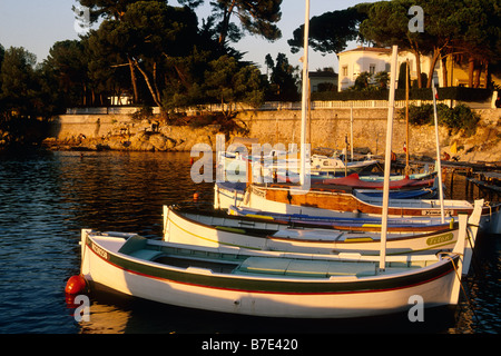 Little fishing boat in the tiny harbour of Olivette Stock Photo