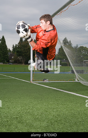 Goalkeeper making a save Stock Photo