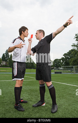 Referee giving red card Stock Photo