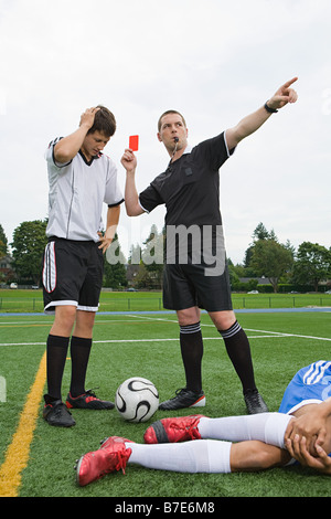 Referee giving red card Stock Photo