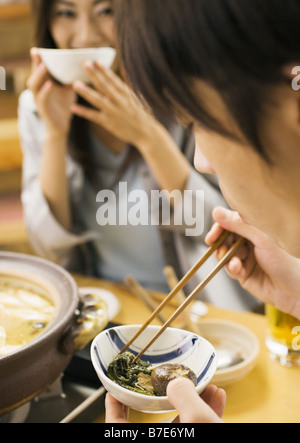 Couple Eating Japanese Style Chowder Stock Photo