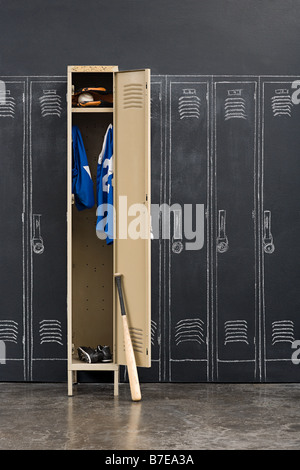 Baseball uniform hanging in a closet Stock Photo