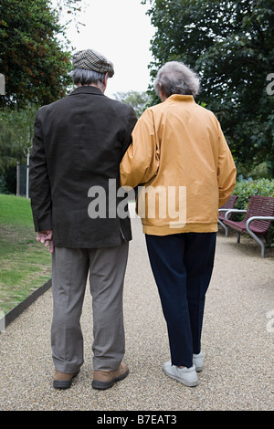 Senior couple walking in park Stock Photo