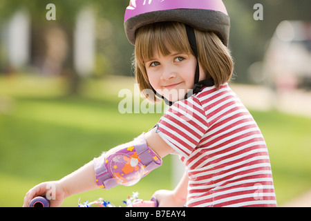 Little girl on a bicycle Stock Photo