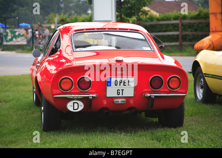 Opel GT classic retro 1970 sport car motor vehicle oldtimer German red chrome show exhibit rear view lights 1972 Stock Photo