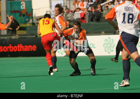 One hockey player committing what appears to be a painful foul against another player at the Euro Nations 2007 in Manchester uk Stock Photo