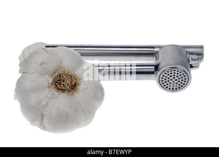 fresh garlic and press isolated on a white background Stock Photo
