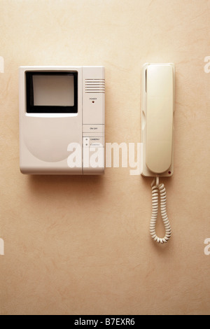 Phone and video observation system on a wall Stock Photo