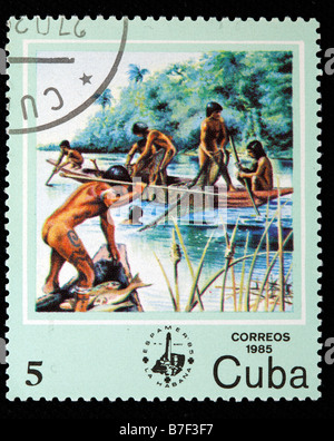 Fishing Life of primitive men prehistoric primeval savage, postage stamp, Cuba, 1985 Stock Photo