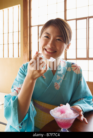 Woman eating shaved ice