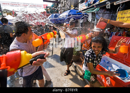 Young people celebrating the Thai new year of Songkran on Khaosan Road, Banglamphu Bangkok Thailand Stock Photo