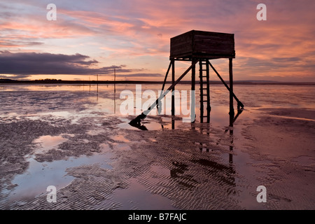 A refuge hut on the course of the Pilgrim's Causeway across to the island of Lindisfarne, Northumberland Stock Photo