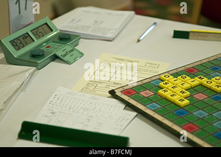 Scrabble board, notepads and timer at end of game at Northern Ireland Scrabble championship Stock Photo