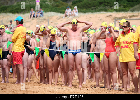 swimmers line up to start the avalon beach surf swim,avalon,sydney,australia Stock Photo