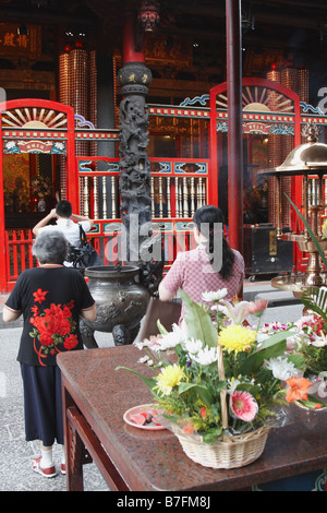 People Praying At Longshan Temple, Taipei Stock Photo