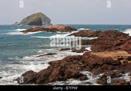 Rocky coastline Rawa Island Malaysia Stock Photo