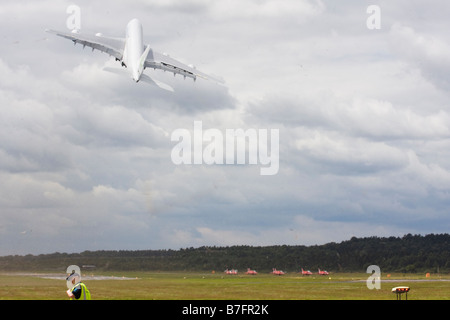 Airbus A380-800 taking off and kicking up a dust storm at Farnborough International Airshow 2008 UK Stock Photo