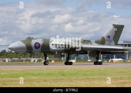 Avro Vulcan bomber landing at Farnborough International Airshow 2008, England, United Kingdom. Stock Photo